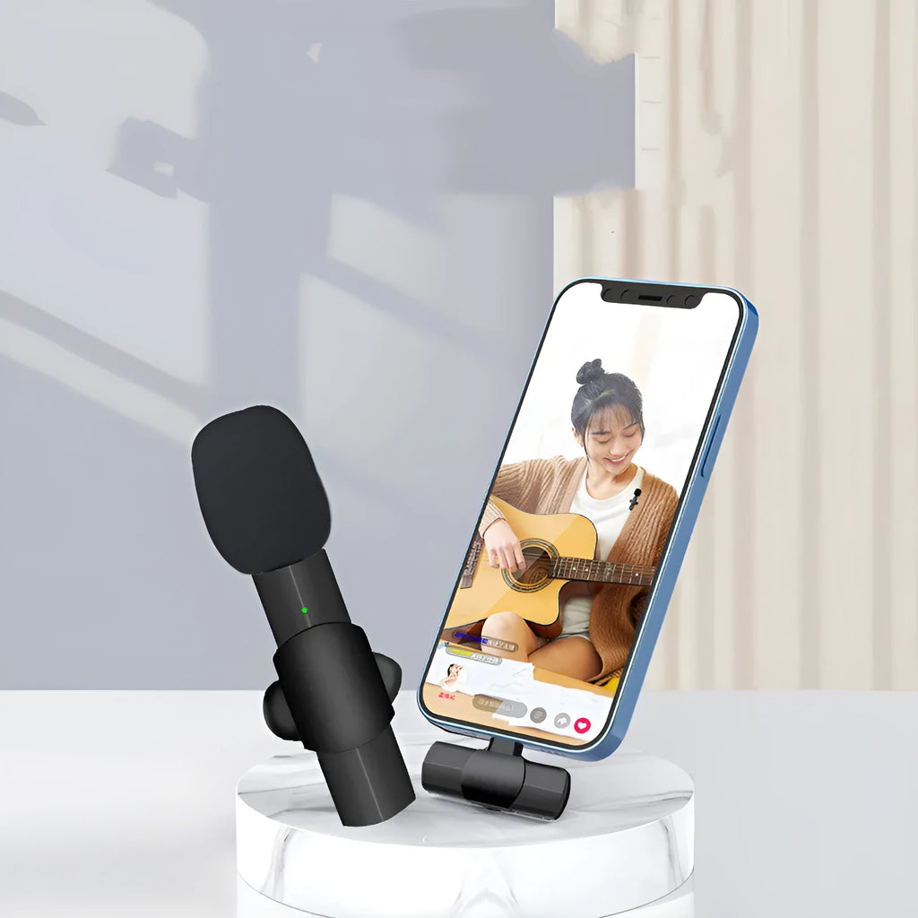 Black wireless lavalier microphone with moving coil technology and omnidirectional pickup for mobile recording