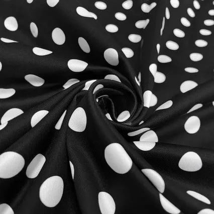 Multicolour polka dot pleated midi dress with a square collar and short sleeves on a hanger.