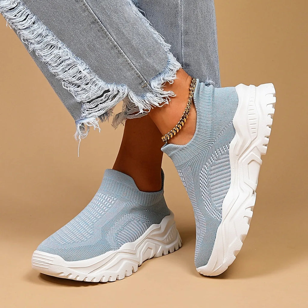 Women's light blue mesh slip-on casual shoes with round toe design