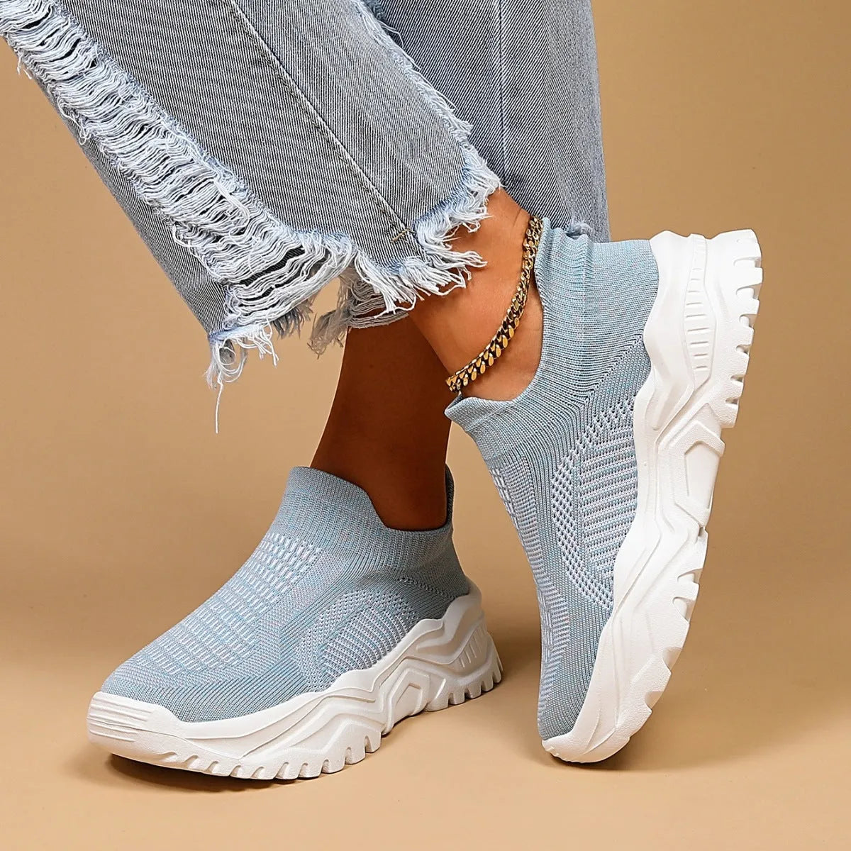 Women's light blue mesh slip-on casual shoes with round toe design