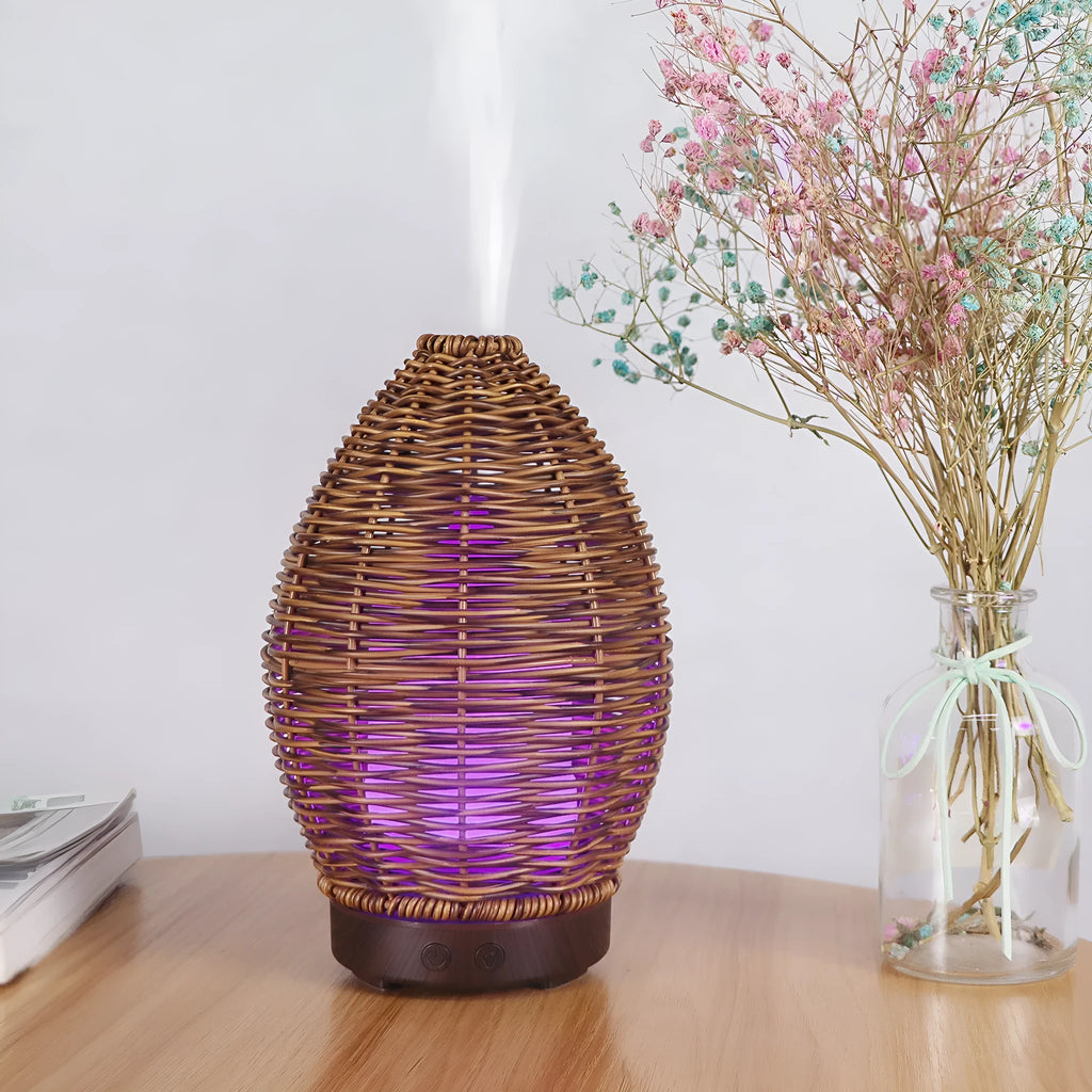 Hollow rattan aroma diffuser with light wood grain base and 100ml capacity for rooms up to 40 square metres