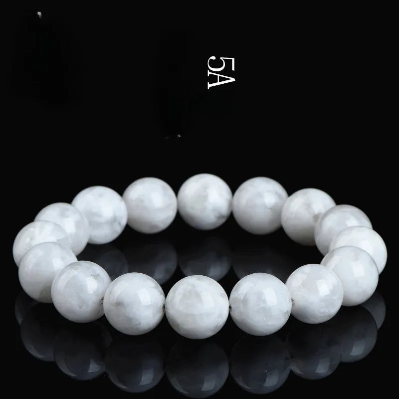 Original design women's crystal bracelet with natural blizzard snowflake round beads on a wrist.