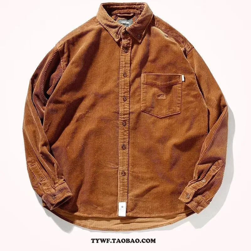 Man wearing a loose caramel corduroy long sleeve cardigan-style shirt