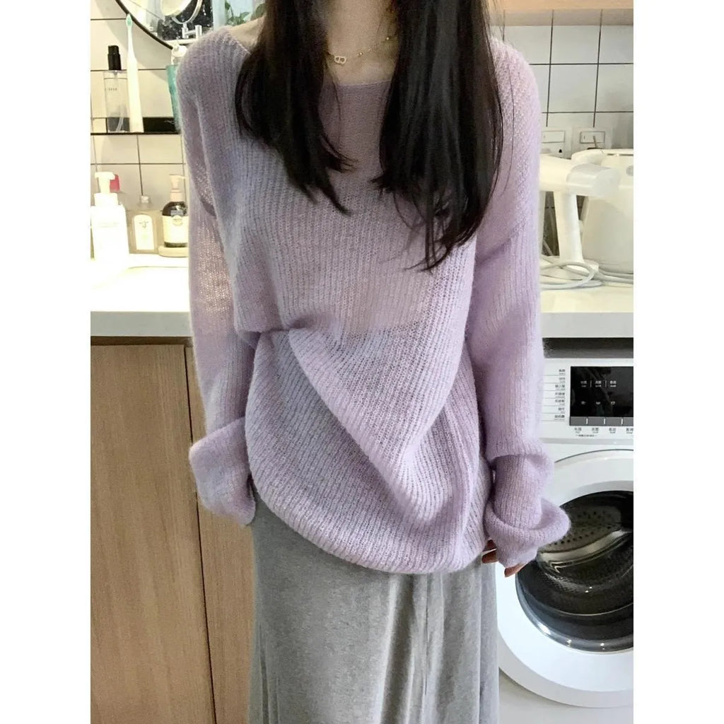Purple women's Ice Silk blouse with hollow-out princess sleeves on a hanger.