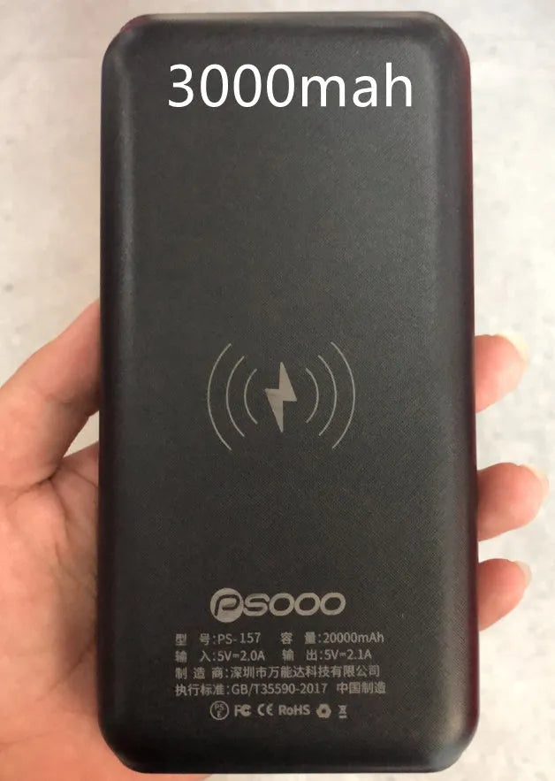 Wireless power bank with Qi charging showing three USB ports and LED flashlight in black-blue colour
