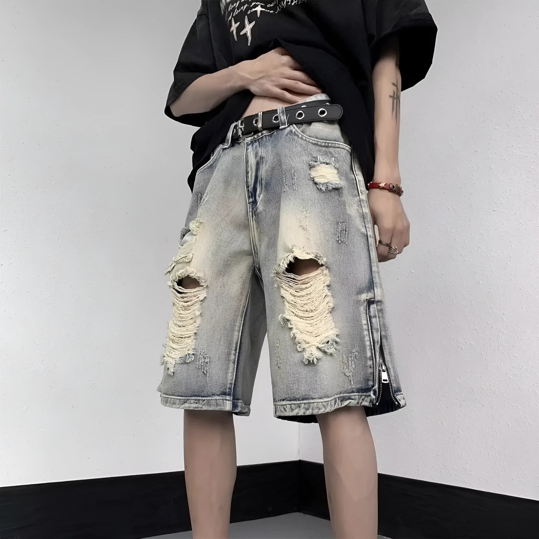 Blue retro distressed denim shorts with wide-leg loose fit on Asian size mannequin