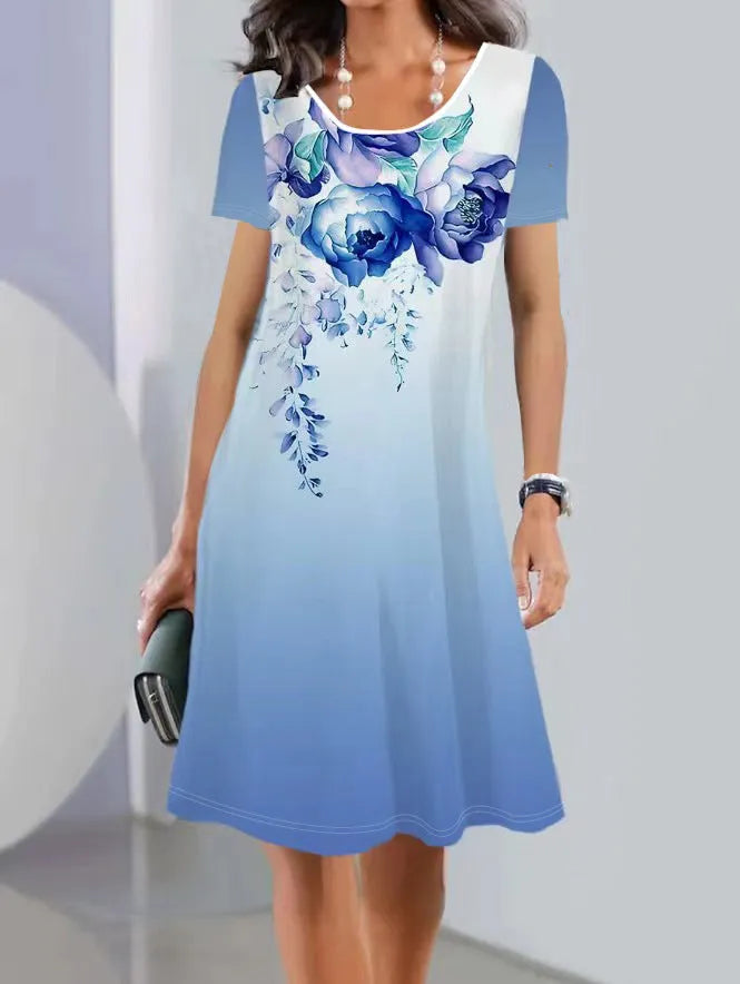Women's floral print midi dress with short sleeves and a round neckline, shown in an A-line silhouette.