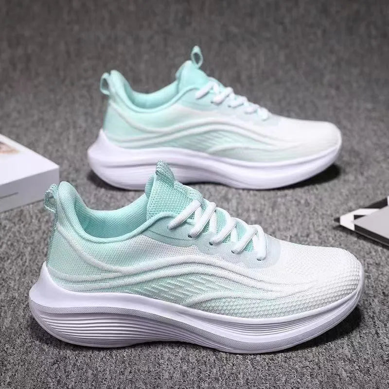 Lightweight mesh running shoes with PVC non-slip sole, front lace-up, sizes 36-40, in white green, light pink, or purple.