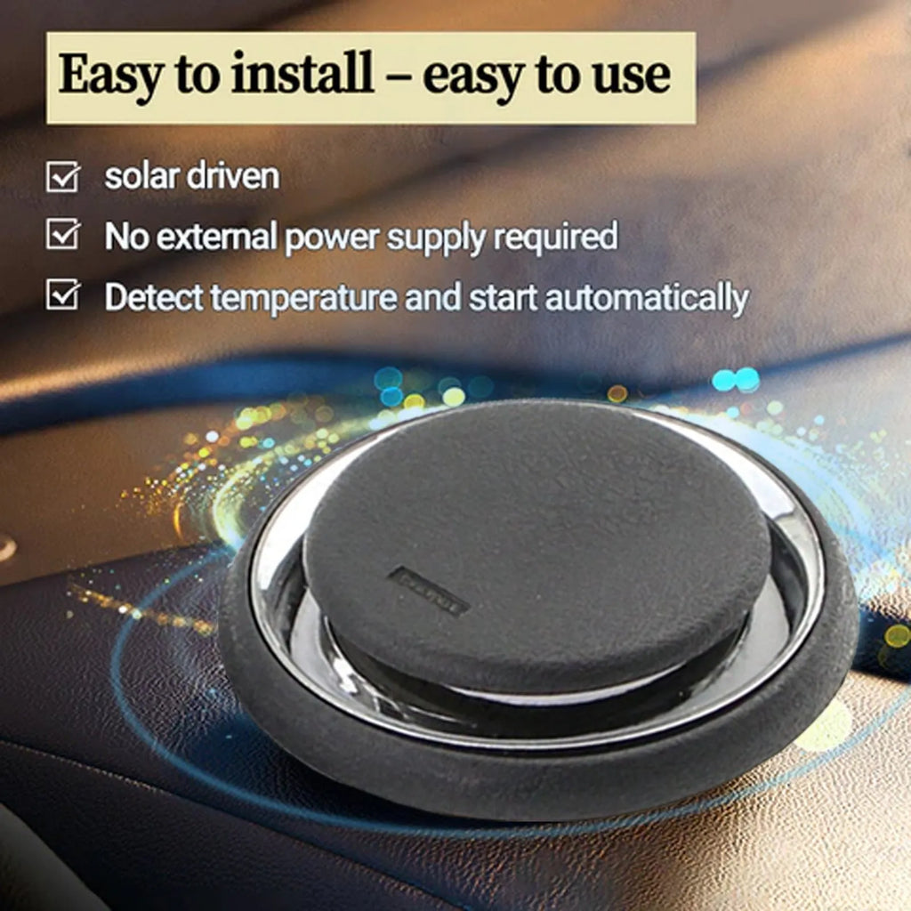 Black portable car deicing instrument for melting ice and snow on vehicle windscreens.