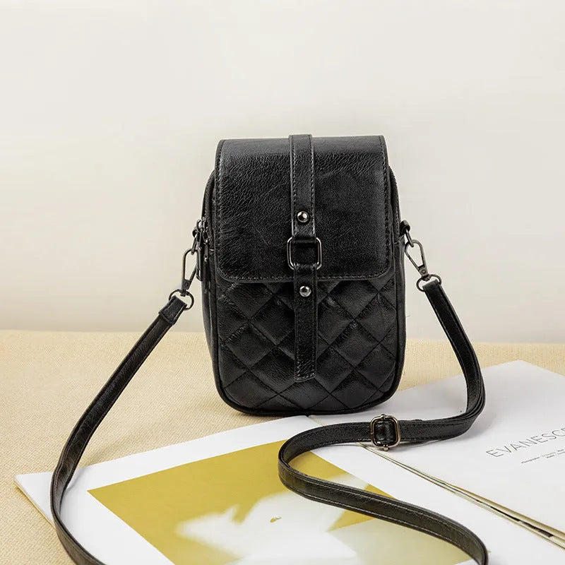 Women's retro crossbody phone bag in brown PU with square clamshell shape and single shoulder strap