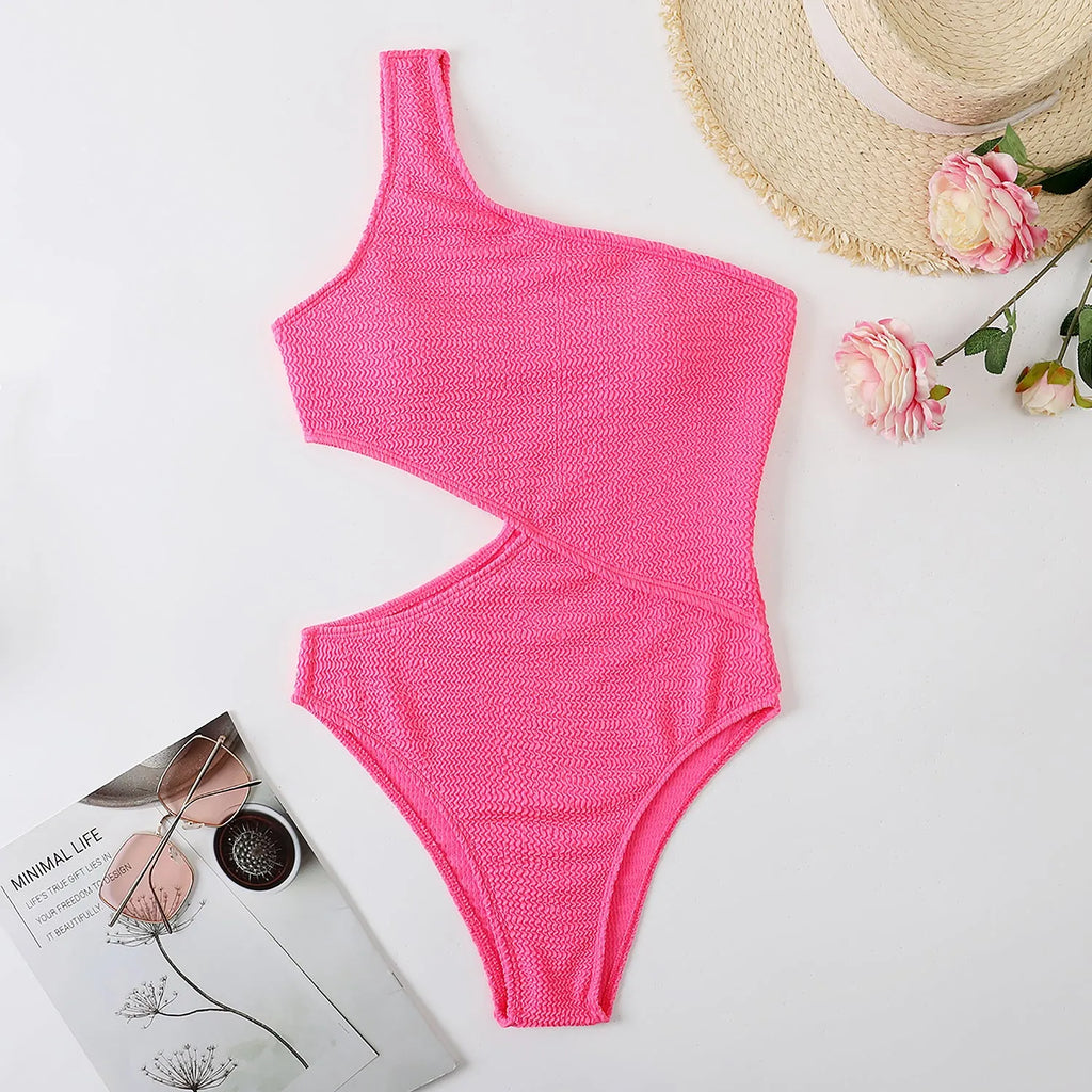 Solid colour women's one piece one shoulder swimsuit in polyester, available in multiple colours