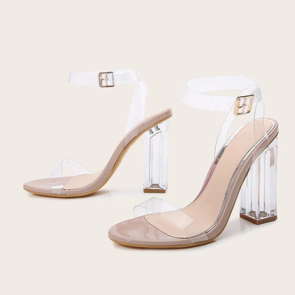 Women's Apricot high heel sandals with a transparent glass heel and a front buckle fastener.