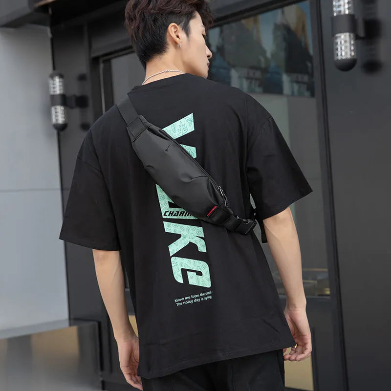 Black oxford cloth waist pack showing front zip and interior phone and ID pockets.