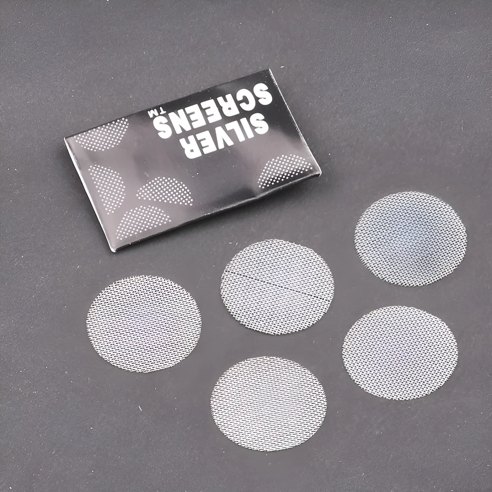 Five silver stainless steel hookah filter mesh plates on white background