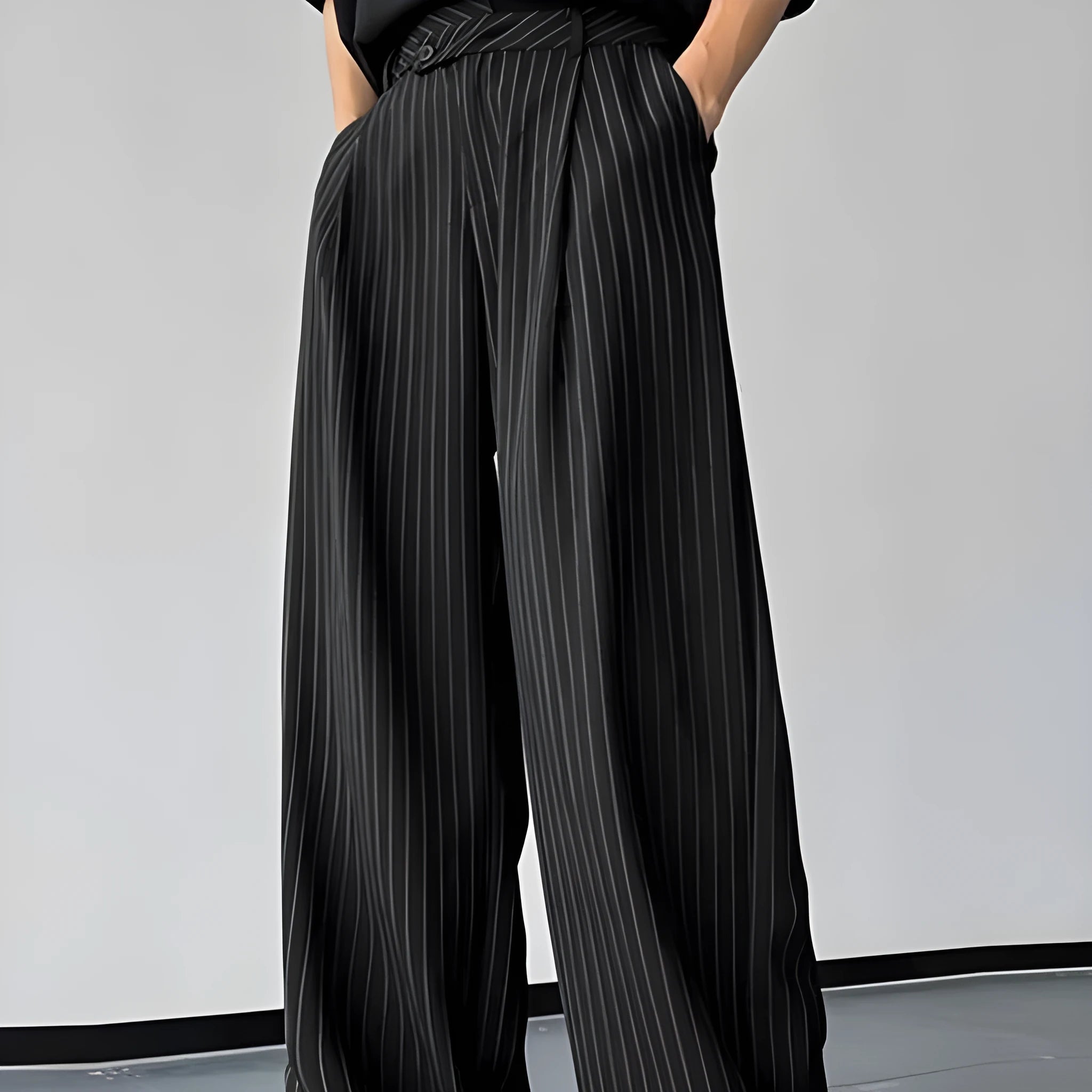 Black men's casual trousers with vertical stripes and front pleats on a high elasticity fabric.
