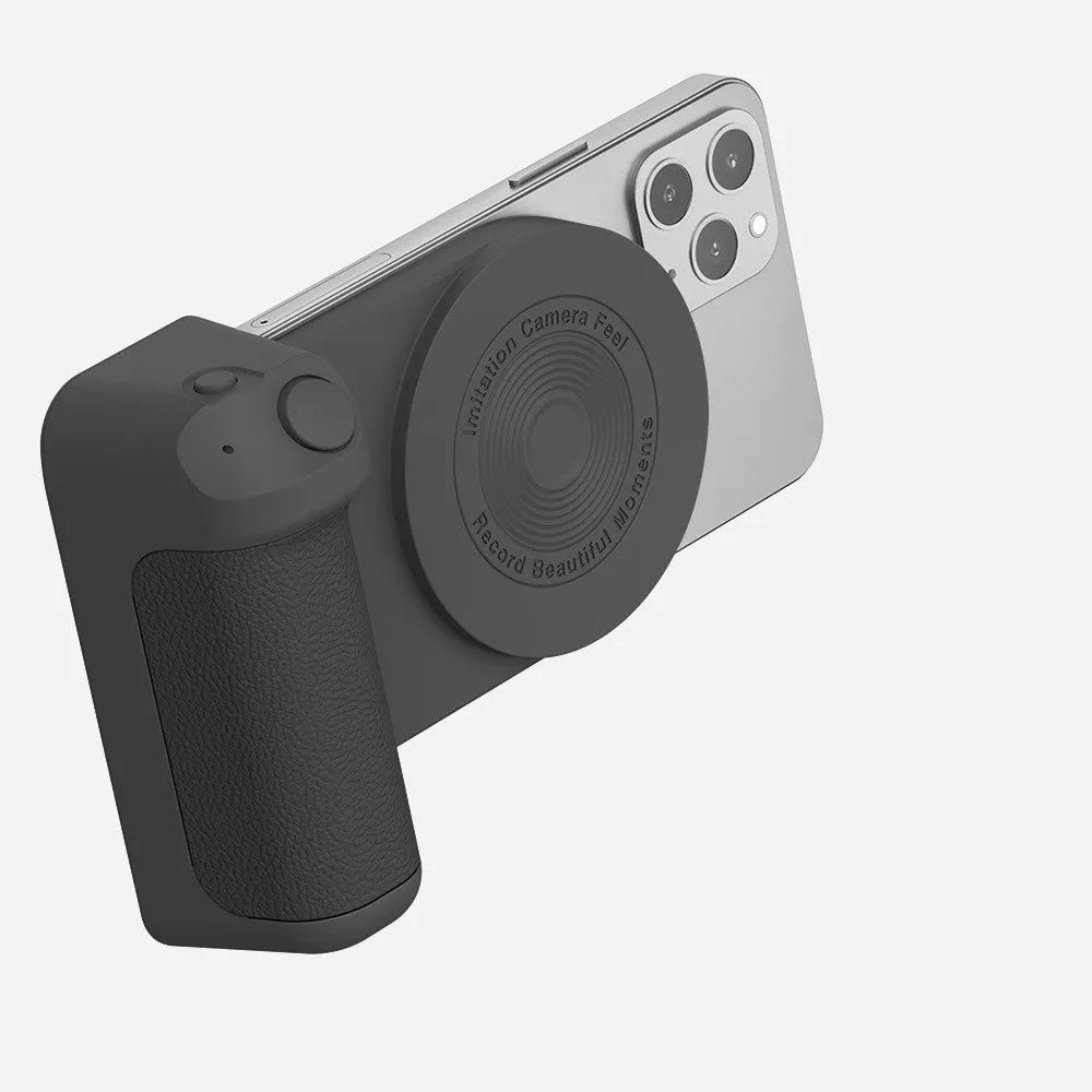 Black magnetic camera grip phone holder with rotatable bracket on wooden table