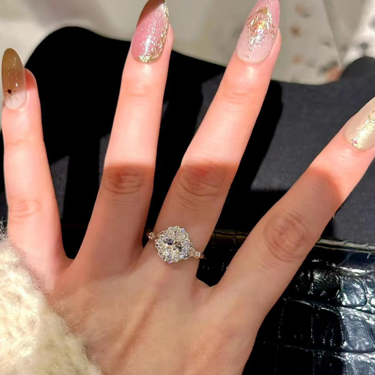 Silver geometric diamond ring for women with adjustable opening.