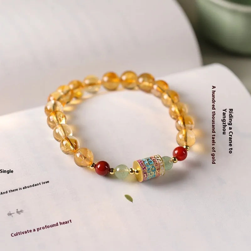 Yellow citrine bracelet with 8mm prayer wheel charm and round beads, retro women's jewellery.