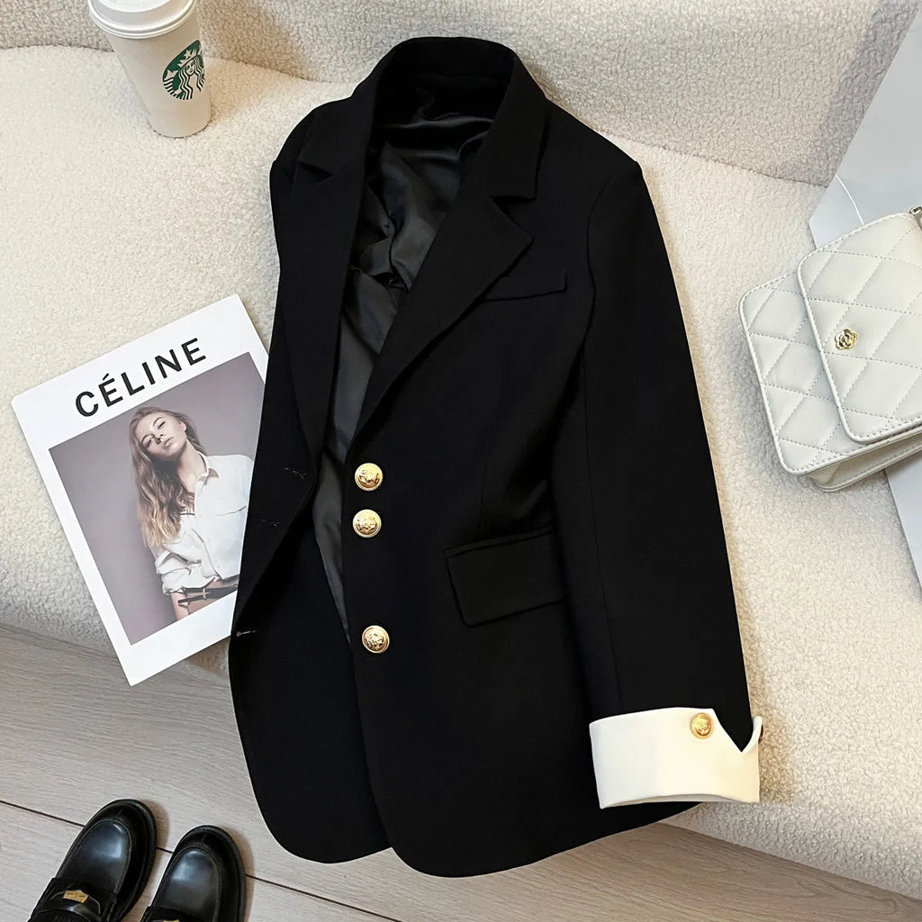 Korean style loose fit women's coat in milky white, showing medium length and pocket details.