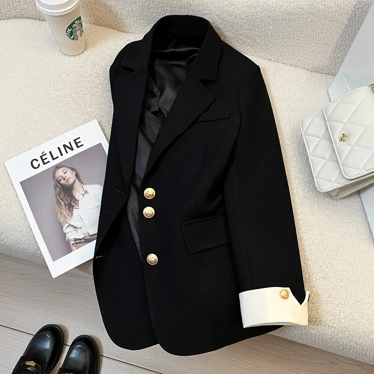 Korean style loose fit women's coat in milky white, showing medium length and pocket details.