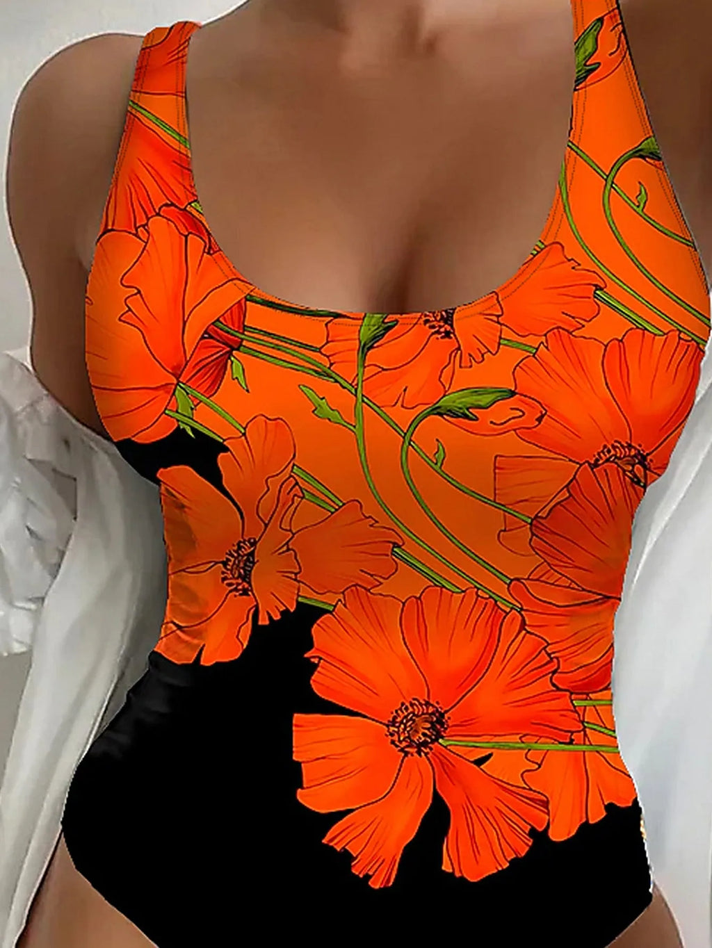 Orange floral print backless one-piece swimsuit on a hanger, showing slim fit design.
