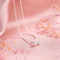 Silver cherry pendant necklace for women with adjustable snake chain.