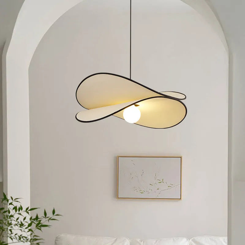 French style fabric potato chip chandelier pendant light in white, shown in a bedroom setting.