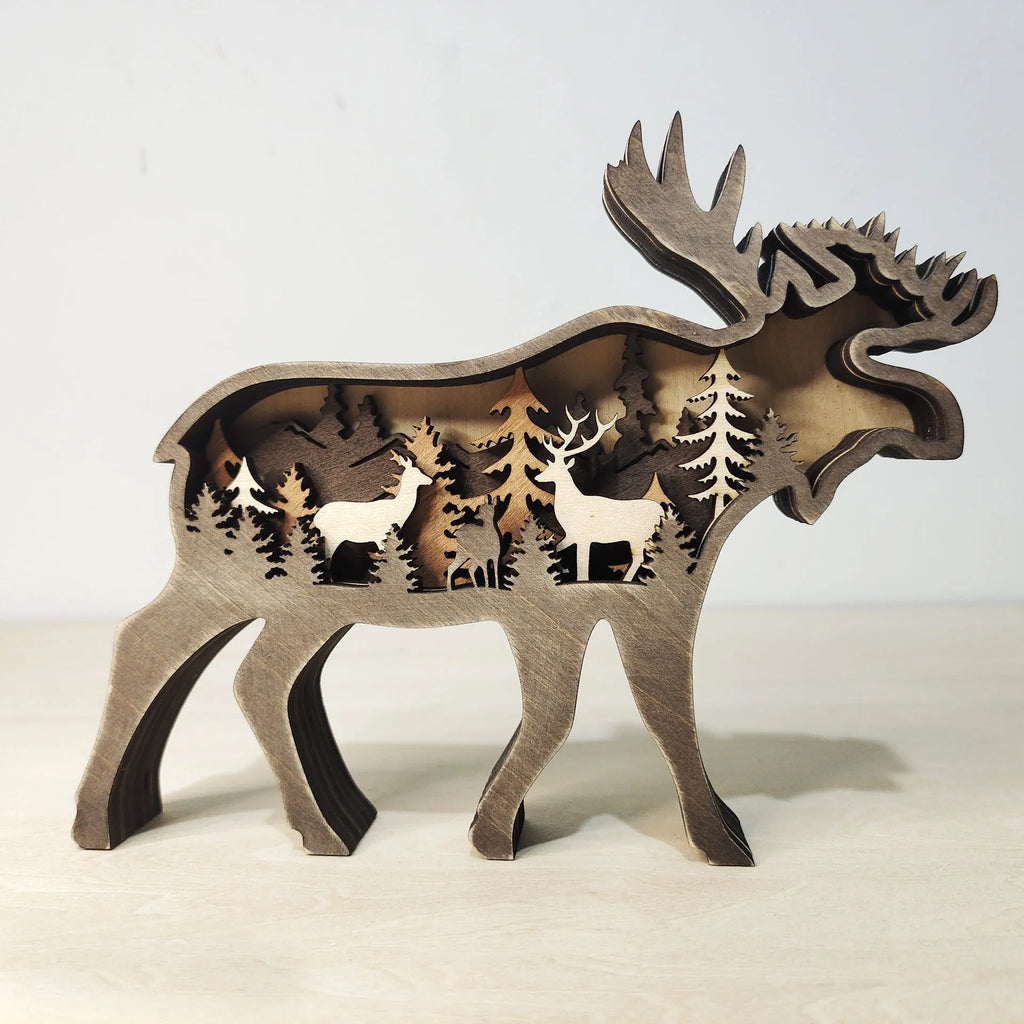 Boxwood elk ornament 18cm tall with antlers, natural wood finish, on a tabletop