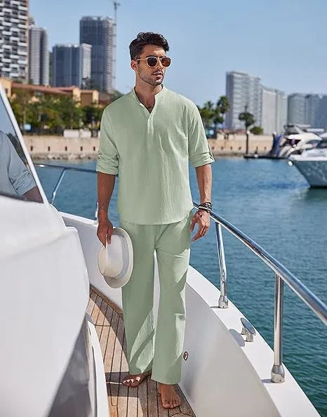 Men's casual cotton suit set in a solid colour, featuring trousers and a long-sleeve jacket.