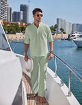 Men's casual cotton suit set in a solid colour, featuring trousers and a long-sleeve jacket.
