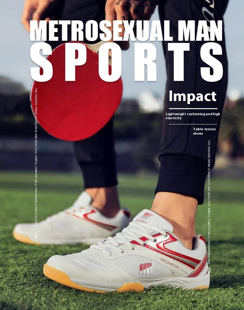Table tennis sneakers in white and red colour with mesh upper, natural rubber outsole and front lace-up closure
