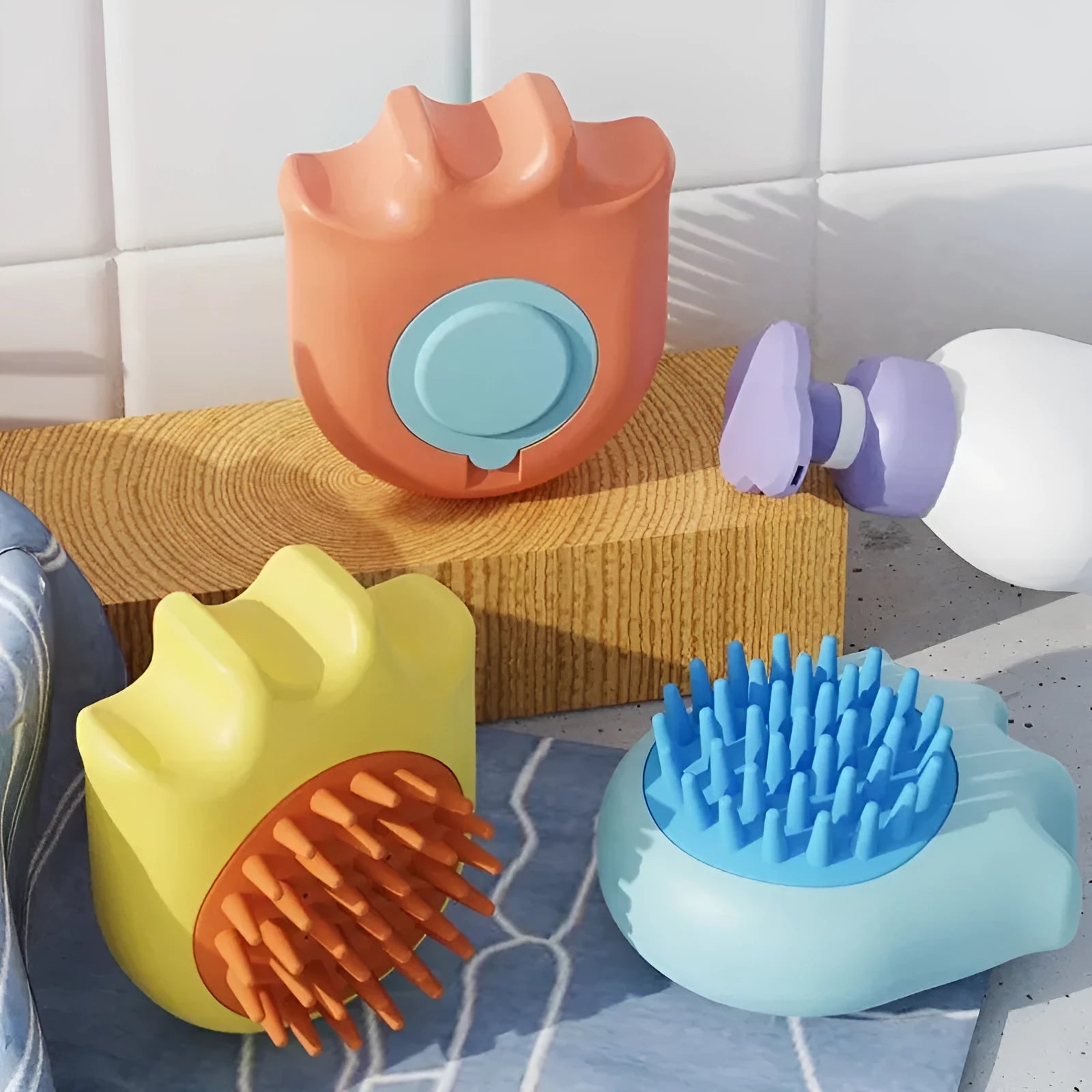 Blue pet bath brush with shampoo box attachment for washing cats and dogs