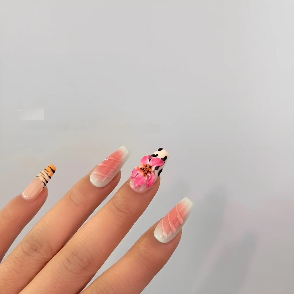 Zebra pattern lily hand carving nail art set showing embossed designs in multiple sizes
