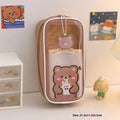 Large transparent PVC pencil case with a vertical cartoon dog design, zippered closure.