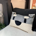 Rectangular grey schnauzer pattern dog pillow on a sofa, showing dimensions of 50 cm by 35 cm.