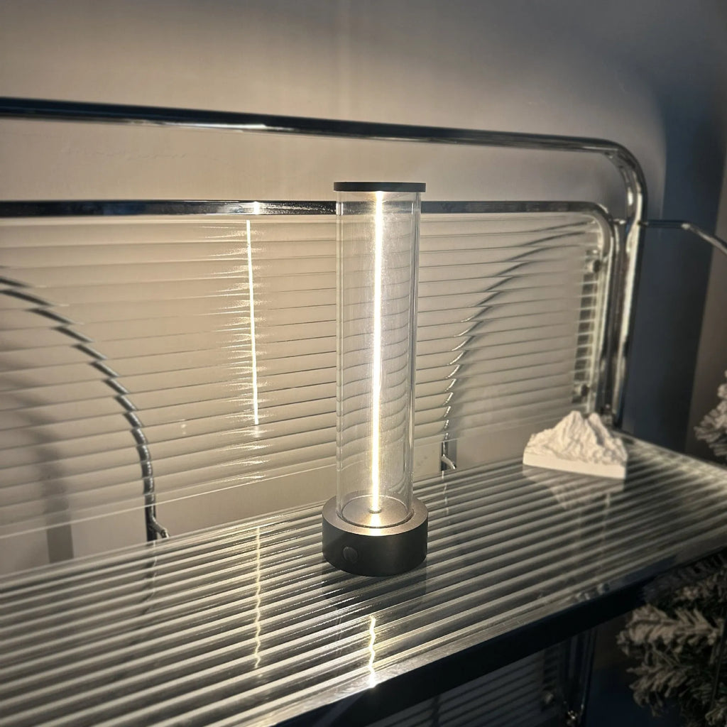 Tall, narrow modern USB LED night light strip with glass panel and magnetic base.
