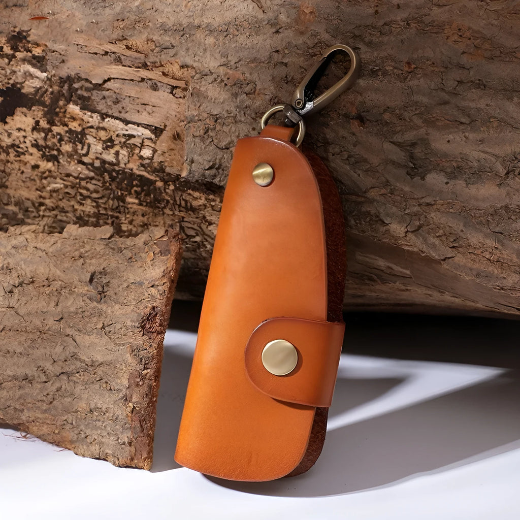 Genuine leather car key case in four colour options showing multifunctional storage design