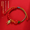 Red cinnabar bracelet with hand-woven geometric peace buckle in national style