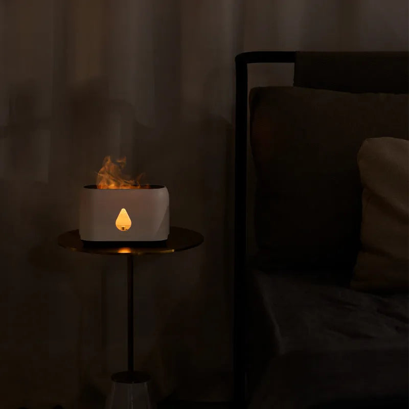 Mini remote control flame diffuser humidifier in white round plastic with single fog outlet and USB cable