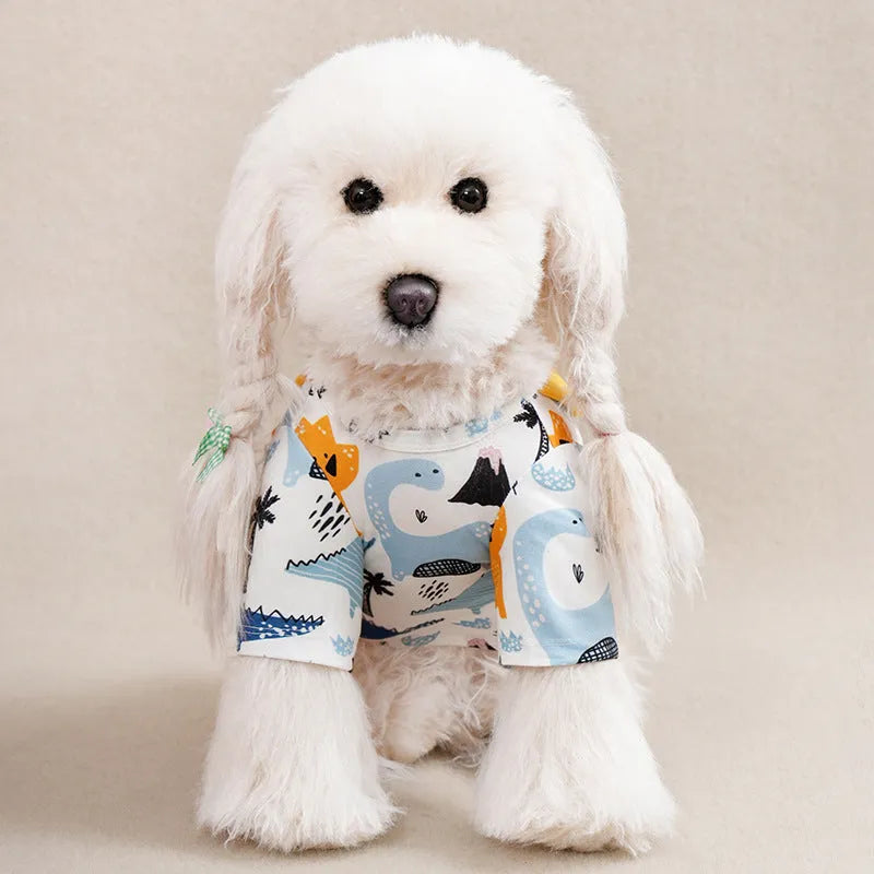 Small dog wearing a colourful printed polyester t-shirt, showing the casual fit and full-body design.