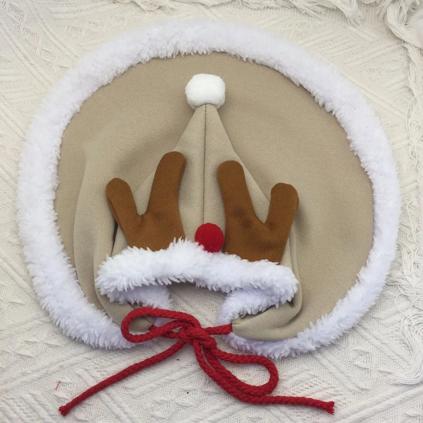 Cat Christmas cape with velvet stars hat in green, adjustable ties, side view on a cat