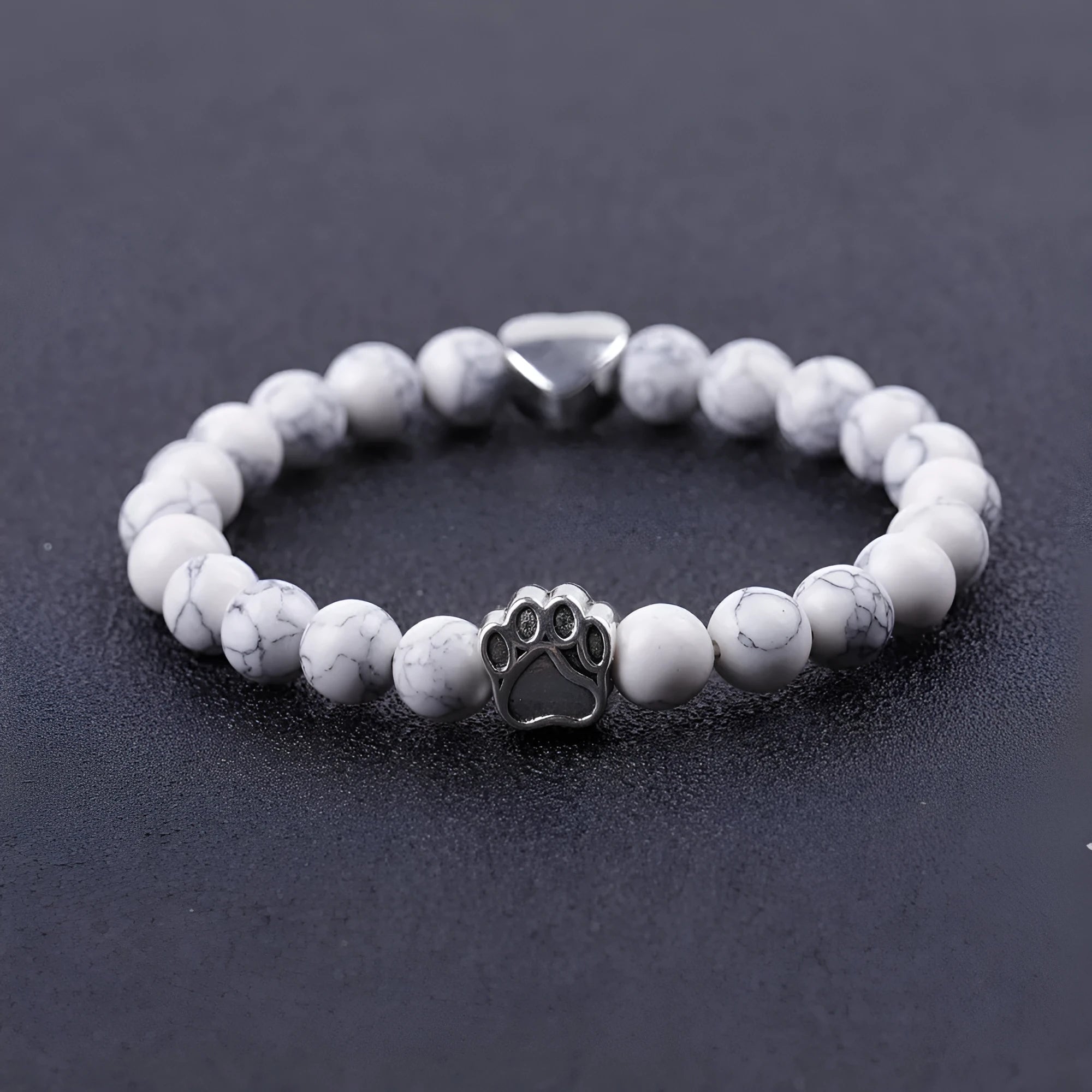Tigereye stone bracelet with dog's paw charm, Indian agate beads, and a love heart charm on a beaded band.