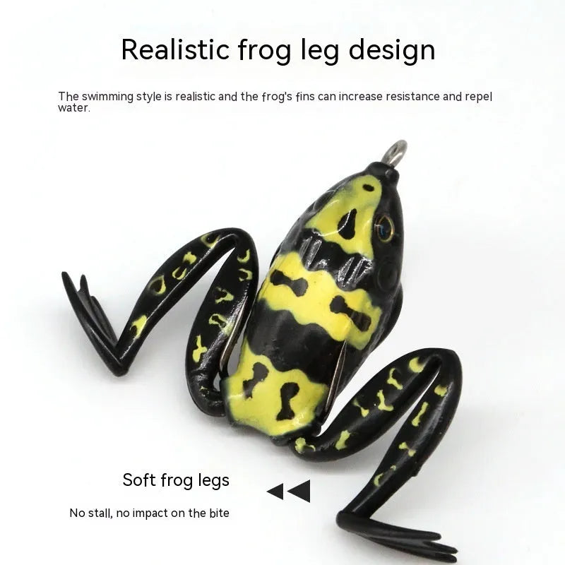 Artificial frog fishing lure with snake head design and double treble hooks in grass green colour