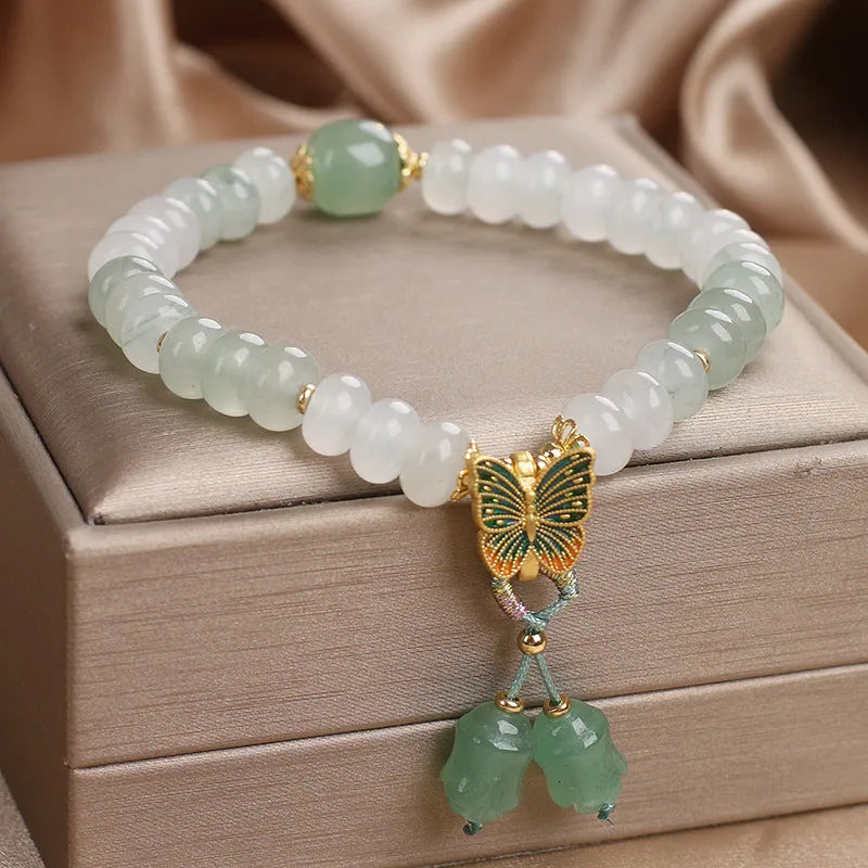 Green Tian Shan Cui abacus beads jade bracelet with retro butterfly and crystal tassel decoration