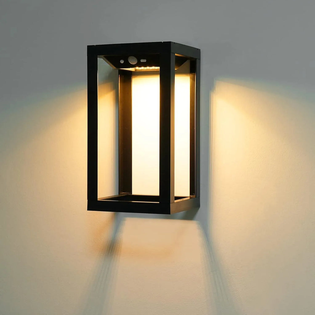 Modern plastic solar-powered outdoor wall lamp with IP65 waterproof rating for garden and villa use.