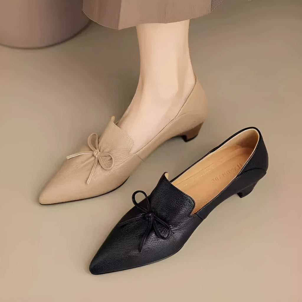 Women's low heel pointed toe shoes in black with PU upper and soft surface finish