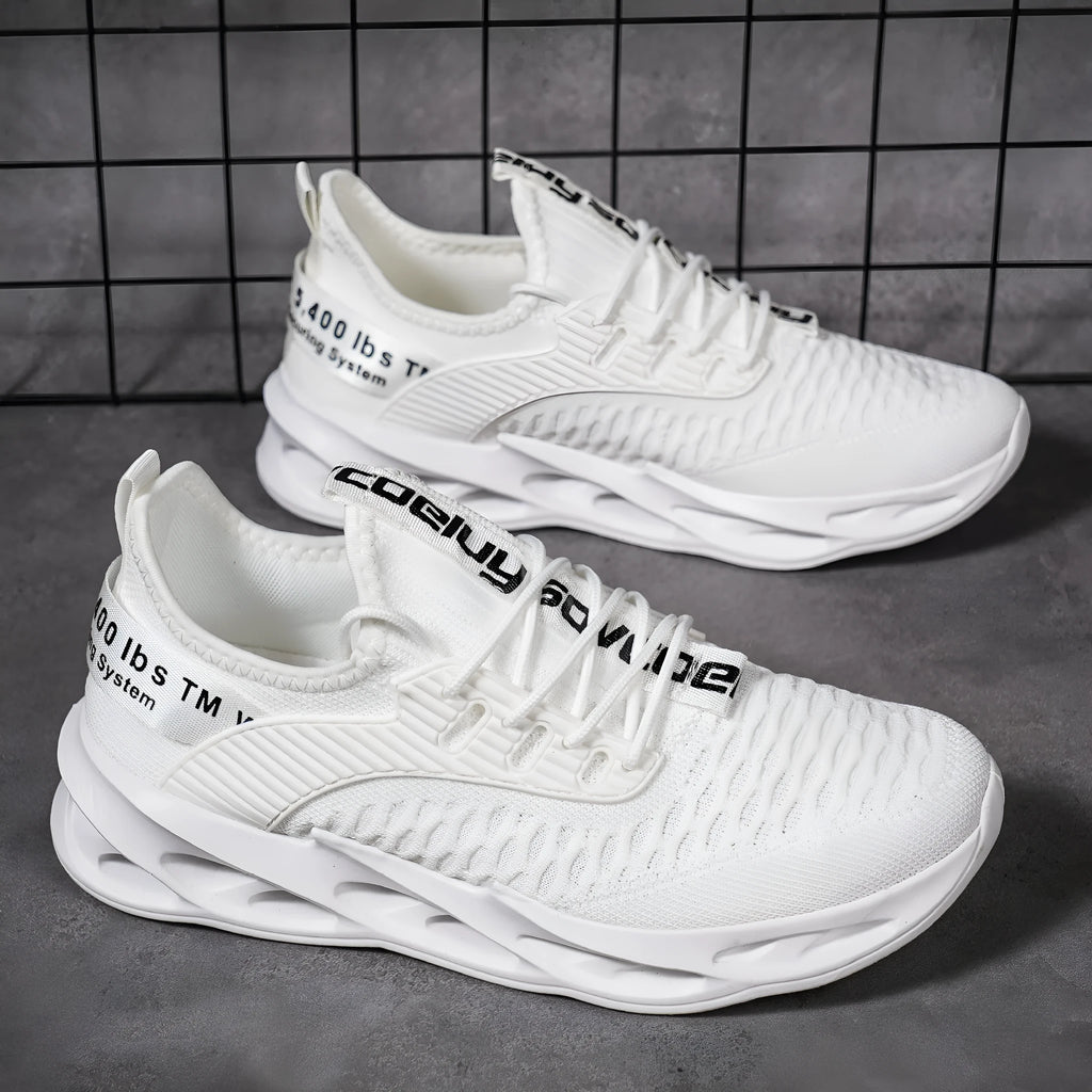 Women's FlyKnit mesh casual trainers in black, showing round toe and flat heel design.