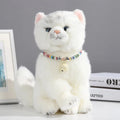 Coloured ethnic-pattern adjustable dog or cat collar with a small metal bell attached, shown in pink.