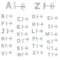 Gold plated alphabet letter earrings showing brass construction with zircon detail on English letters