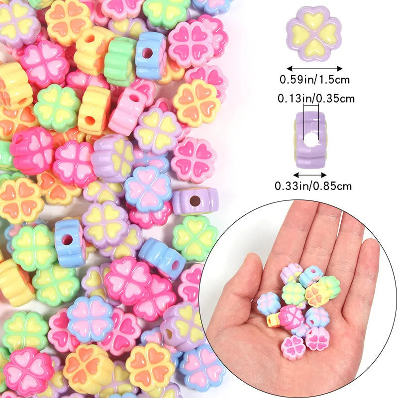 Assortment of 15mm frosted acrylic four-leaf clover beads in rose red, pink, yellow, green, blue, and purple.